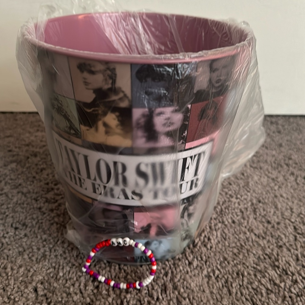 Taylor Swift AMC pink tin bucket with friendship bracelet